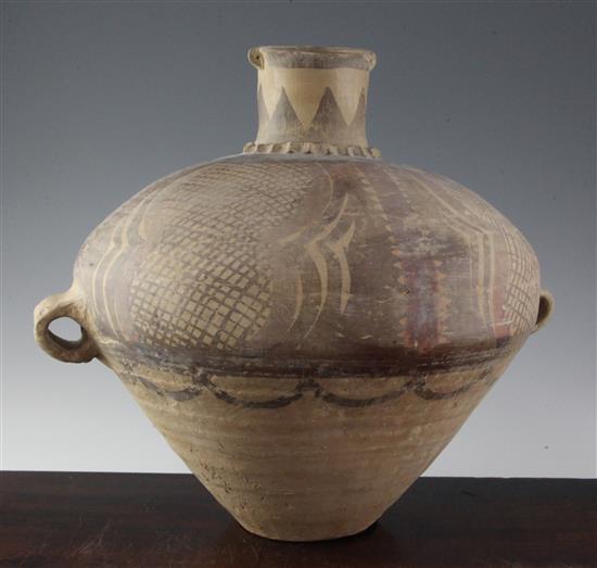 A large Chinese Neolithic pottery two-handled jar, Majiyao Culture c.3300 - 2050 B.C., 35.5cm